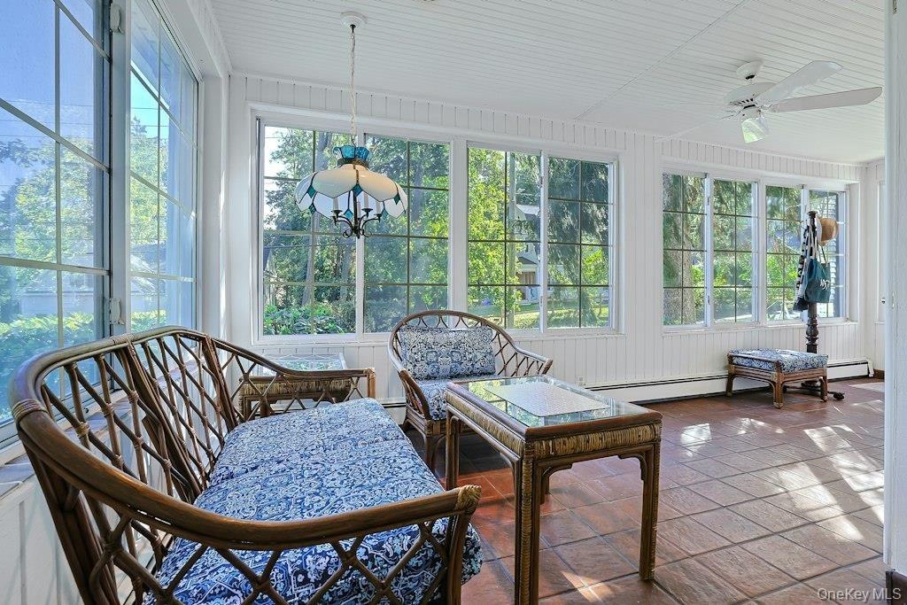 The two entrances meet in a huge wrap around sunroom!