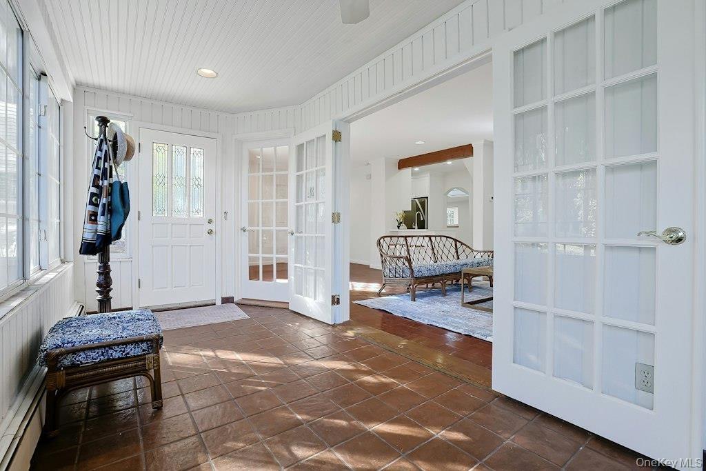 Entry from driveway and toward Living Room #1