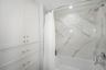 Bathroom II has full closet with drawers