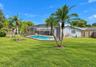 Large backyard behind pool