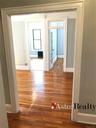 Unit 1R/2 Bedroom Foyer looking into living room w/kitchen entry on left