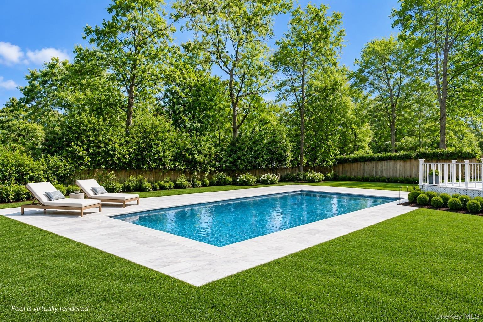 Rectangular inground pool with stone coping, expansive manicured lawn, perimeter fencing, and mature trees