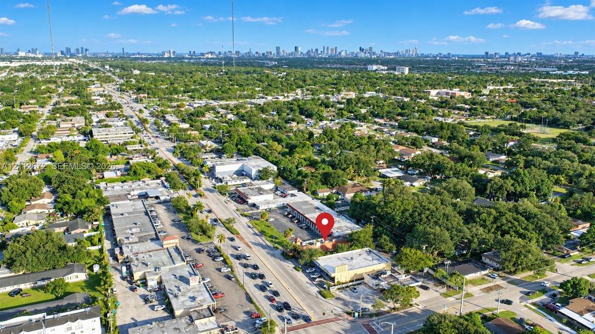 Aerial perspective showing proximity to urban skyline and major thoroughfares