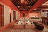 Exposed wood-beam vaulted ceilings, large louvered wooden shutters, stone flooring, and built-in masonry counters