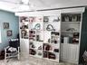 Library Style Murphy Bed shelving on rollers.