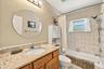 Bath 2, located by pool access.