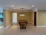 Elegant formal dining with glass chandelier