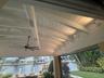 Air conditioning on patio with roll down screens