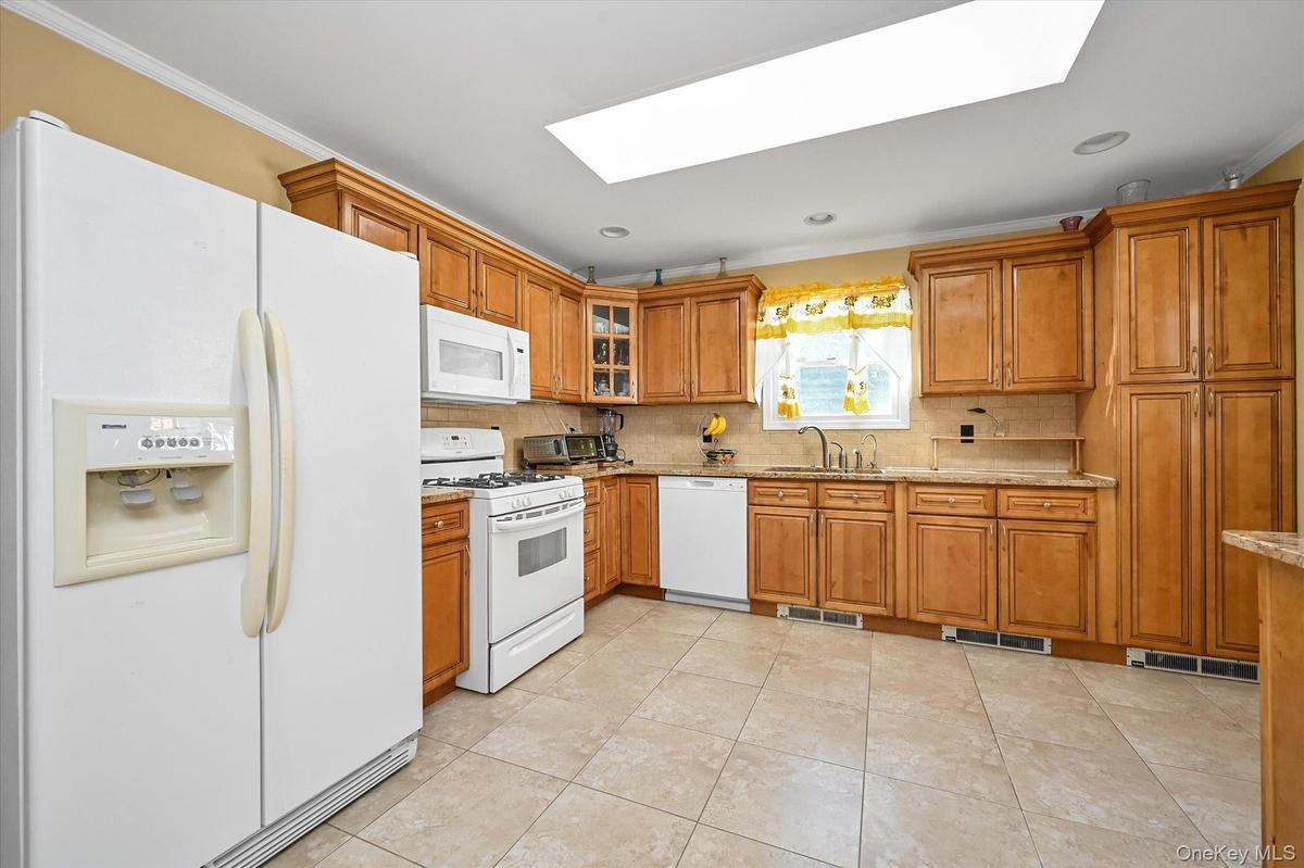 Kitchen leads to backyard deck