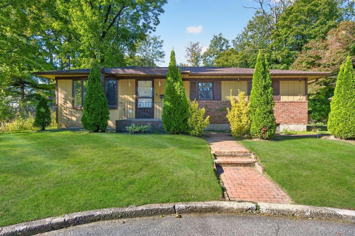 Brick walkway to the home