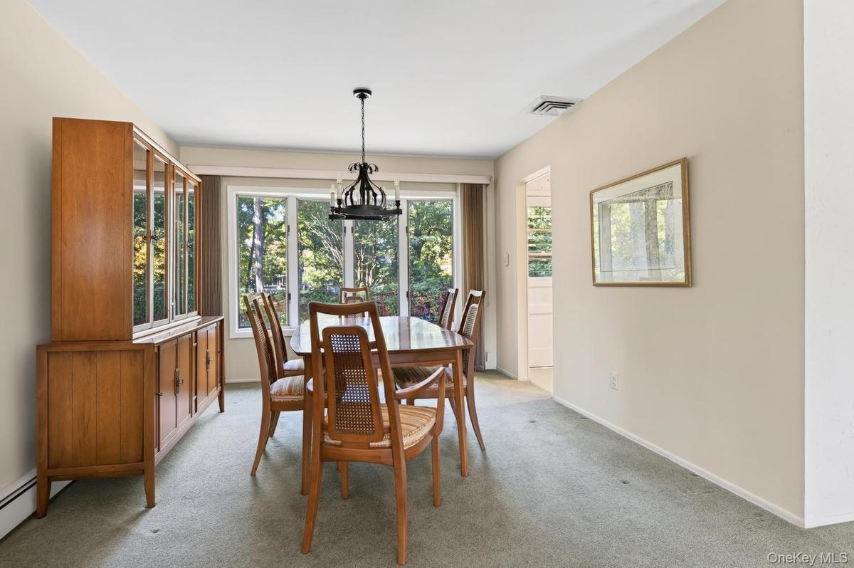 Large bright windows in the dining room