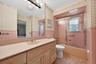 Bathroom with tub and shower
