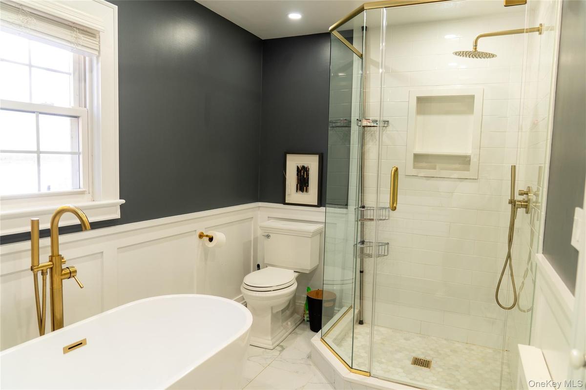 soaking tub, stand up shower and double vanity