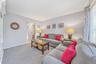 Den with Built-In Entertainment Center, Slider, Open to Kitchen and Entry Foyer
