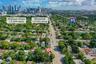 Aerial perspective highlighting urban proximity with skyline prominence and established neighborhood canopy