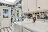 Bathroom/Laundry room with entrance to outside