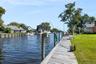 Dock featuring a residential view and a water view