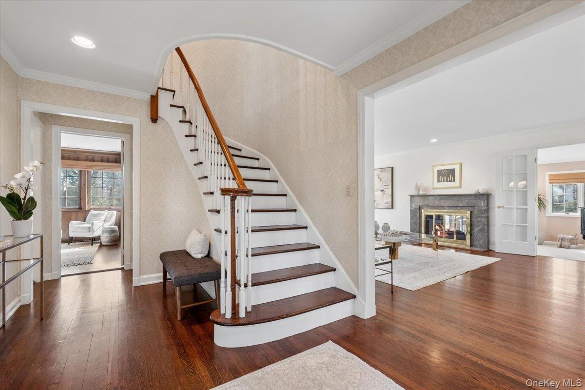 Gracious entry foyer with view to living room