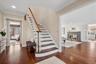 Gracious entry foyer with view to living room