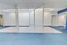 Interior view showing the open area and existing office partitions.