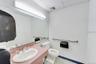First restroom with existing fixtures.