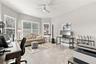 Large front Bedroom with bay window being used as an office and music room