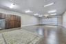 In-Law Suite/Office showcasing 6 car garage with A/C