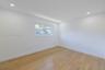 Interior space featuring recessed lighting, wood-finish flooring, and a sliding window
