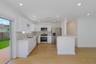 Kitchen featuring white cabinetry, solid-surface countertops, stainless steel appliances, wood-finish flooring, and recessed lighting