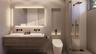 Floating dual-sink vanity with matte black wall-mounted faucets, large LED-backlit mirror, recessed wall niche, and glass-enclosed shower with matte b