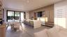 Modern kitchen featuring floor-to-ceiling wood-finish cabinetry, a waterfall-edge stone island, built-in black vent hood, light-toned stone backsplash