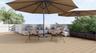 Rooftop terrace featuring composite decking, solid masonry perimeter walls, and built-in planters