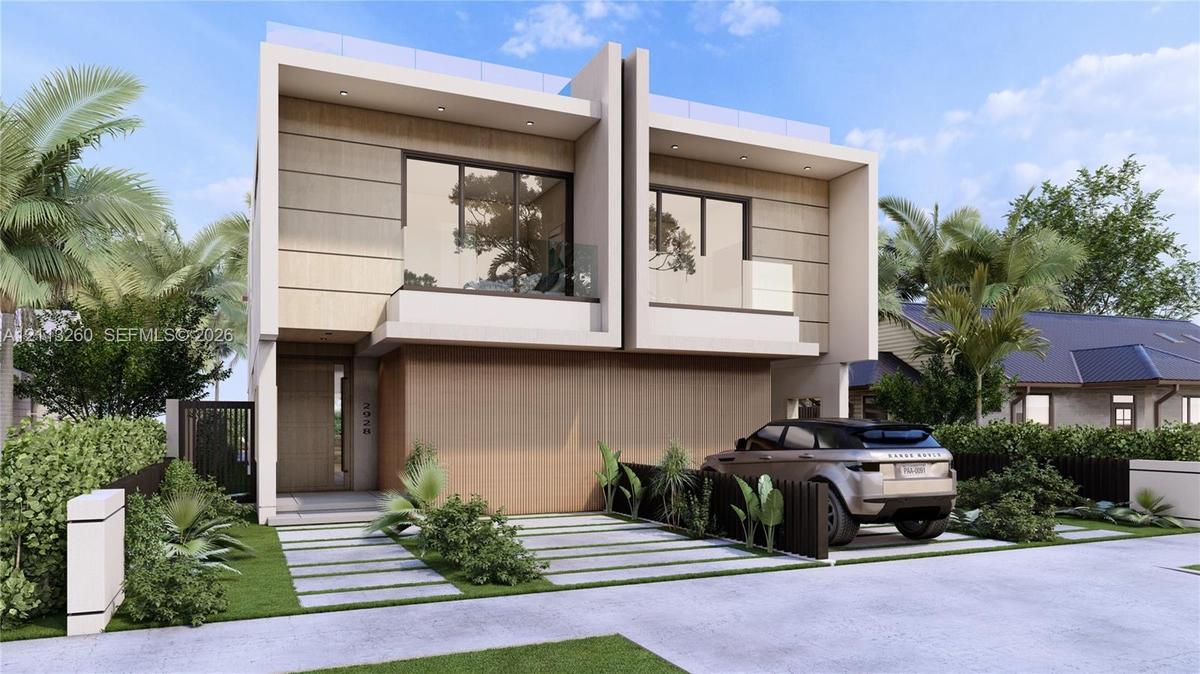 Contemporary two-story exterior featuring a wood-panel facade, floor-to-ceiling glass doors, upper-level balconies with glass railings, and a concrete