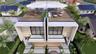 Rooftop terrace featuring wood-finish decking and glass panel railings