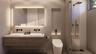 Floating dual-sink vanity with matte black wall-mounted faucets, large LED-backlit mirror, recessed wall niche, and glass-enclosed shower with matte b
