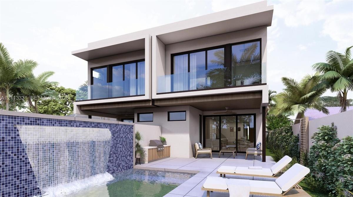 Modern two-story architectural exterior featuring glass balcony railings, a private swimming pool with a tiled water feature, and a built-in outdoor k