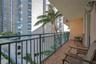 Private balcony featuring tiled flooring, a metal railing, and a wall-mounted light fixture