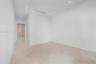 Parquet wood-finish flooring, recessed lighting, and a linear slot diffuser