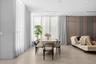 Large-format tile flooring, recessed ceiling lighting, floor-to-ceiling drapery, and multi-tone paneled accent wall