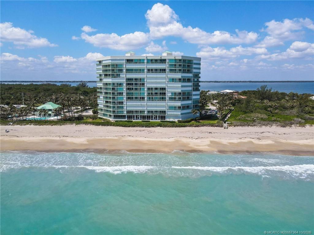 Stunning aerial view of Regency Island Dunes, perfectly positioned along the pristine beaches of Hutchinson Island with the Intracoastal Waterway to t