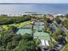 Enjoy an exceptional coastal lifestyle with access to Island Dunes Country Club amenities, including golf, tennis, pickleball, and waterfront recreati
