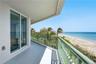 Another view of the wraparound balcony overlooking the pristine shoreline and Atlantic Ocean.