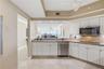 Enjoy ocean views from the kitchen, which opens to the dining and living areas for easy entertaining.