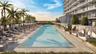 Olympic-length swimming pool featuring a stone-tiled deck and built-in cabana structures
