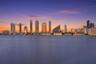 Waterfront location featuring expansive skyline scenery at sunset