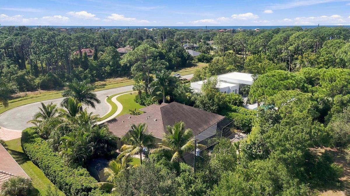 Nestled on an oversized, private .36 acre cul-de-sac lot