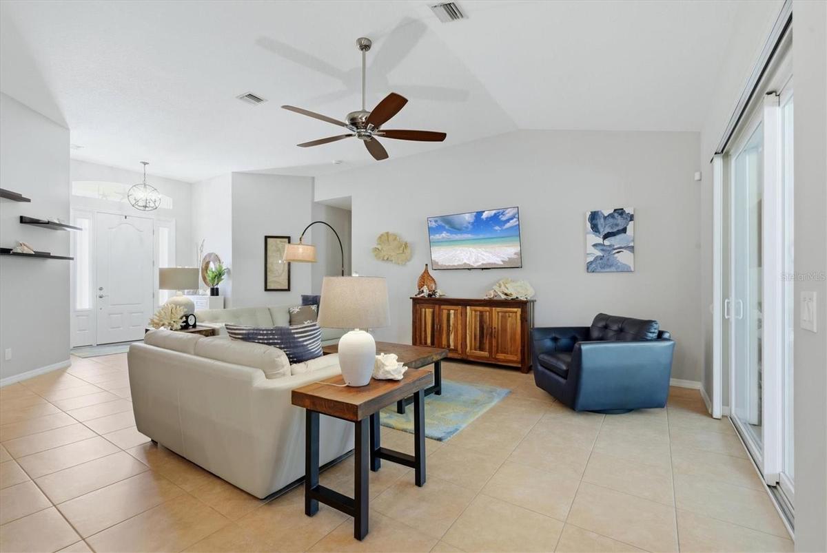 Living Room flows onto the paver lanai