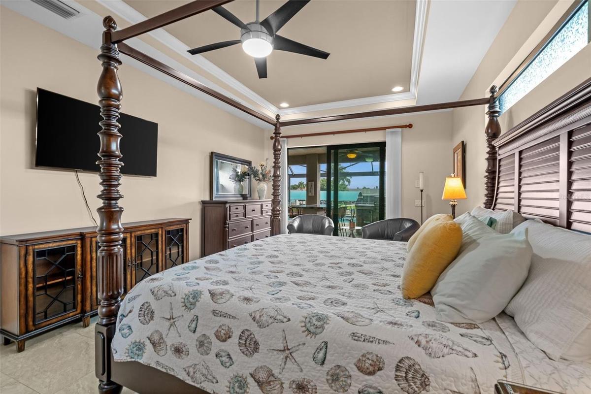 Primary suite is just steps from the pool