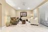 Neutral-toned room featuring diagonal-set tile flooring, recessed lighting, a ceiling-mounted light fixture, and horizontal window blinds