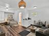 Virtually staged with AI-generated furniture for illustrative purposes only. Property is offered unfurnished.